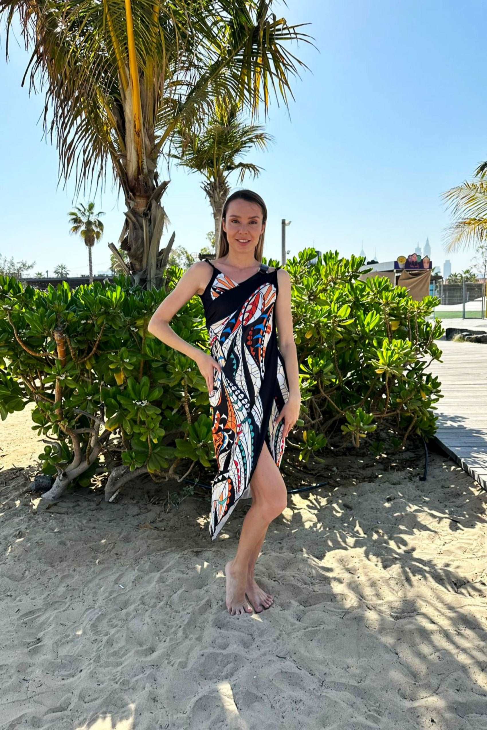 Colorful Butterfly style Beach Dress Pareo. فستان باريو طويلon a woman.